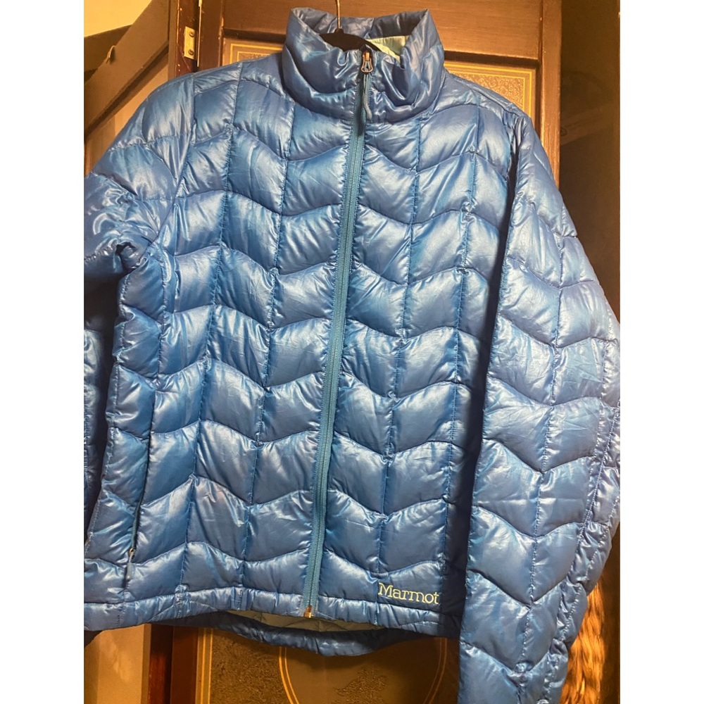 Woman’s Marmot blue down jacket